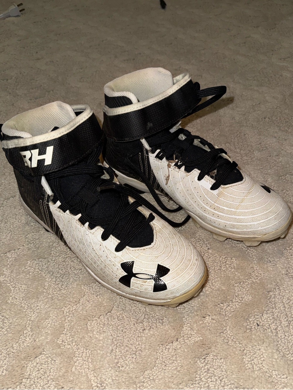 Under Armour Kids Black and White High-Top Athletic Cleats